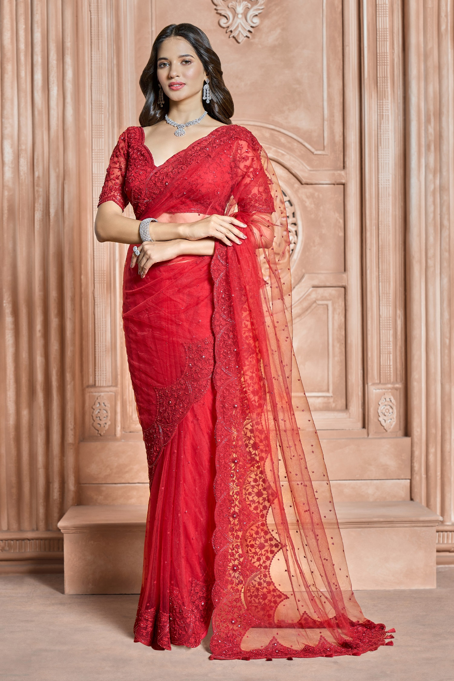 Barn red embellished net saree with matching blouse piece only on Kalki