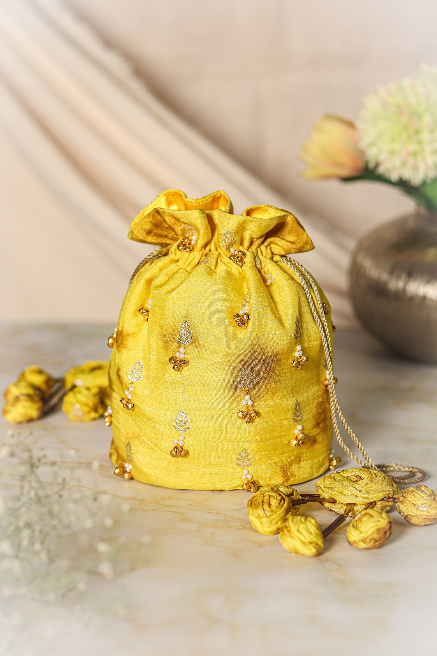 Buy Yellow Sand Tie dyed Potli Bag by Vareli Bafna Online at Aza Fashions