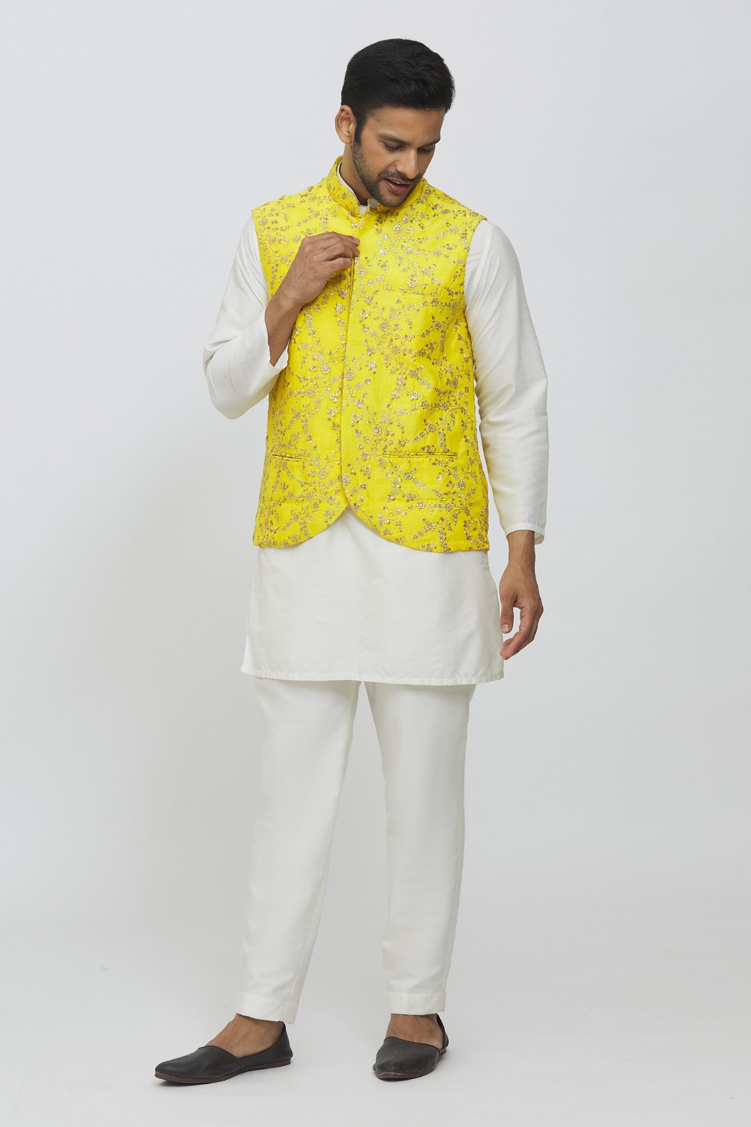 White kurta pajama with best sale yellow jacket