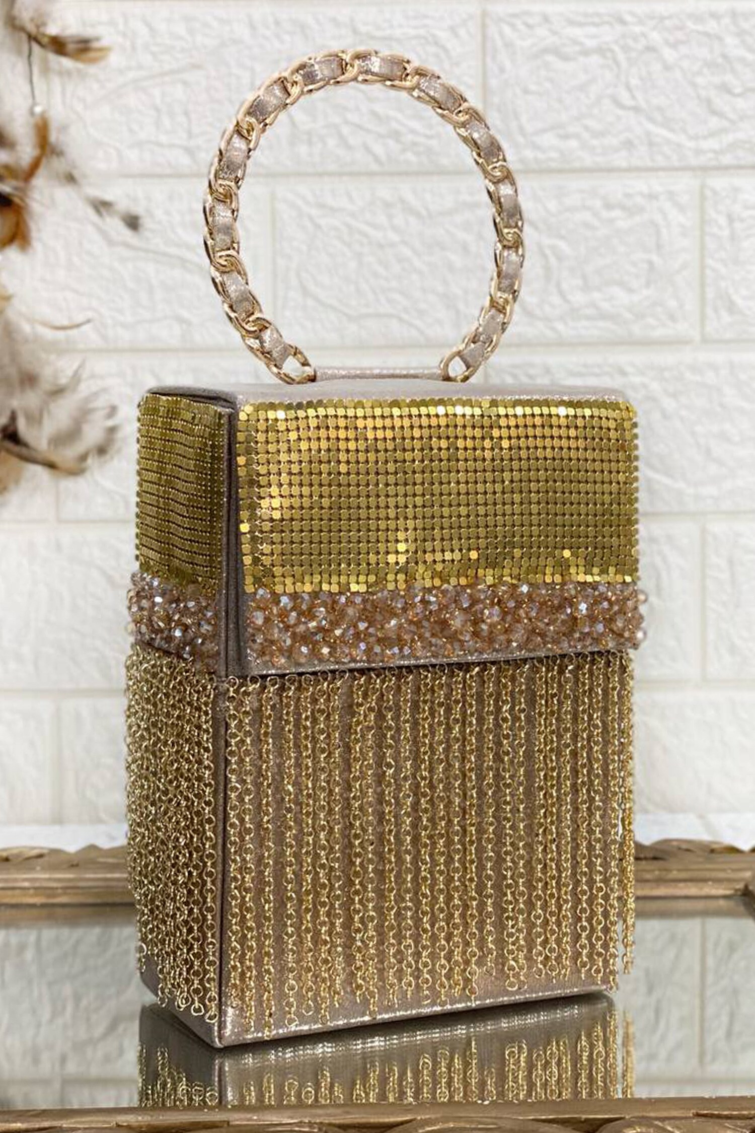 Buy Gold Embellished Tassel Fringe Bag by Kainiche by Mehak Online at