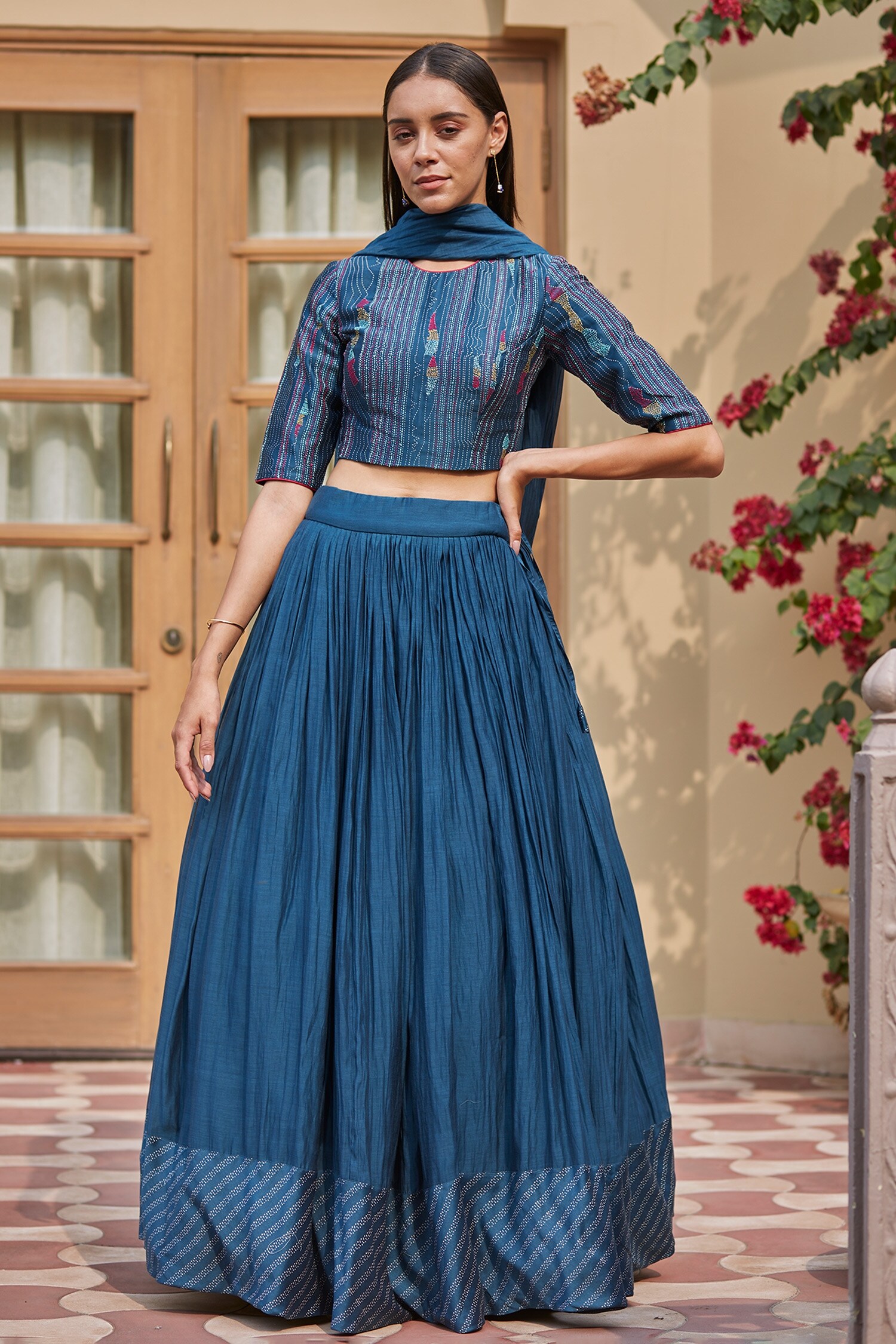Buy Blue Cotton Muslin Embroidered Discharge Round Print Hem Lehenga Set For Women by Vaayu