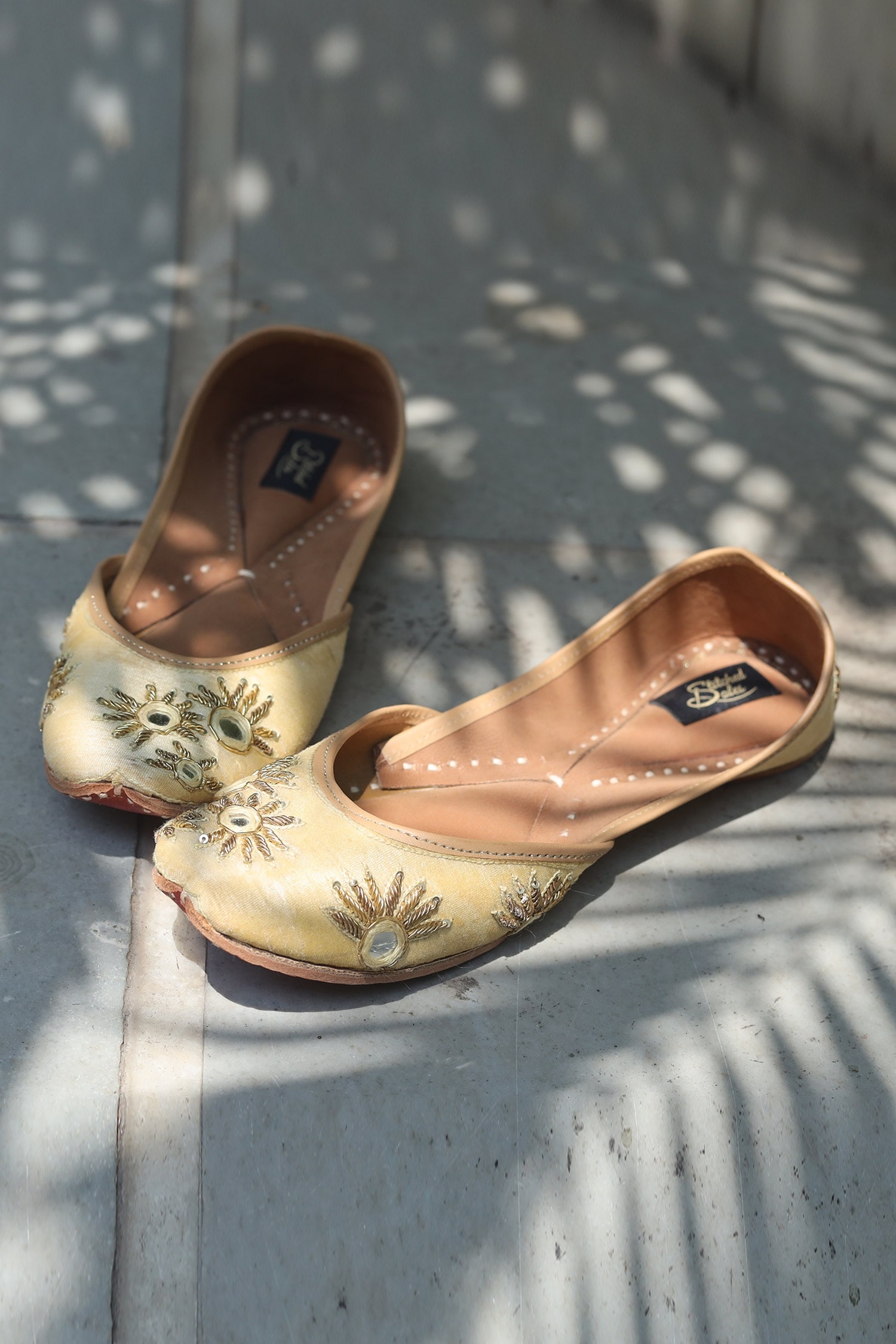 Buy Gold Embroidered Sunflower Juttis by Stitched soles Online at Aza ...