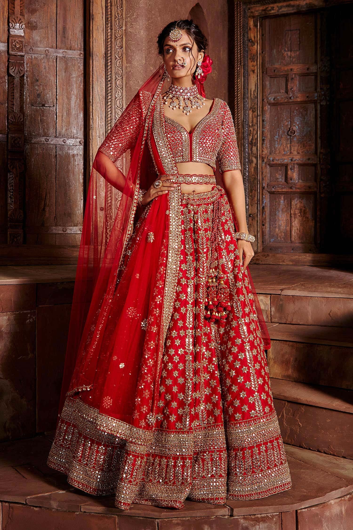 Buy Red Raw Silk And Tulle Embroidered Mirror V Neck Lehenga Set For Women By Nitika Gujral 