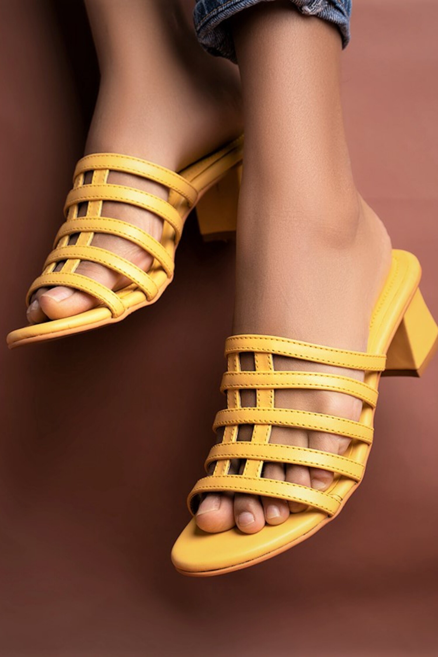 yellow caged heels