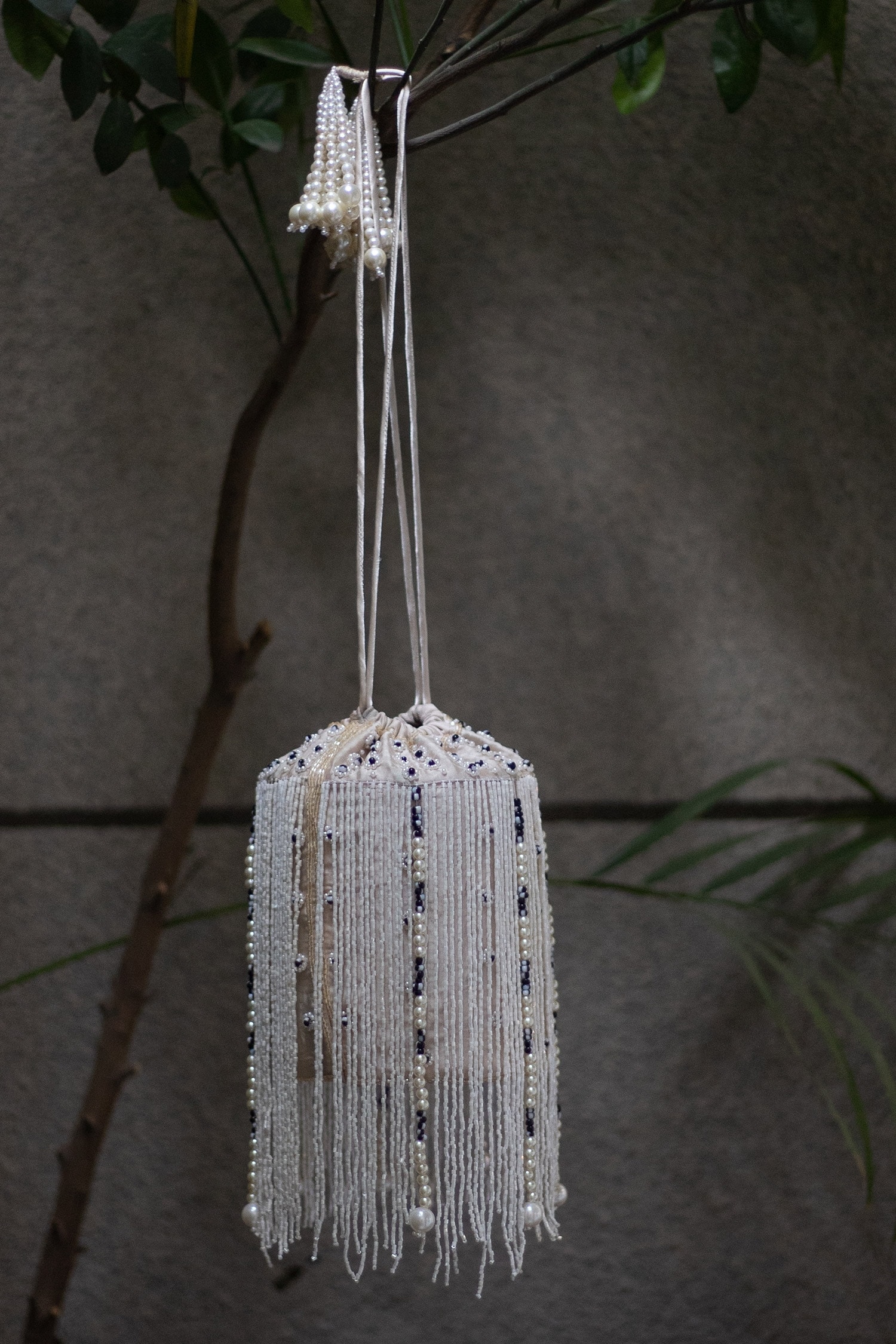 Buy White Embroidered Oorvashi Bead Work Bucket Bag by Aamli Online at ...