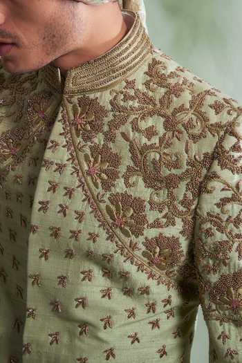 Green sherwani set with solid kurta, floral printed & glitter work coat with matching pants main image 1