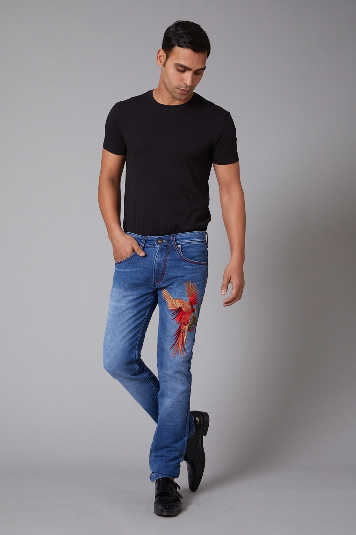 Buy Blue Denim Embroidered Eagle Motif Jeans For Men by Rohit Bal ...