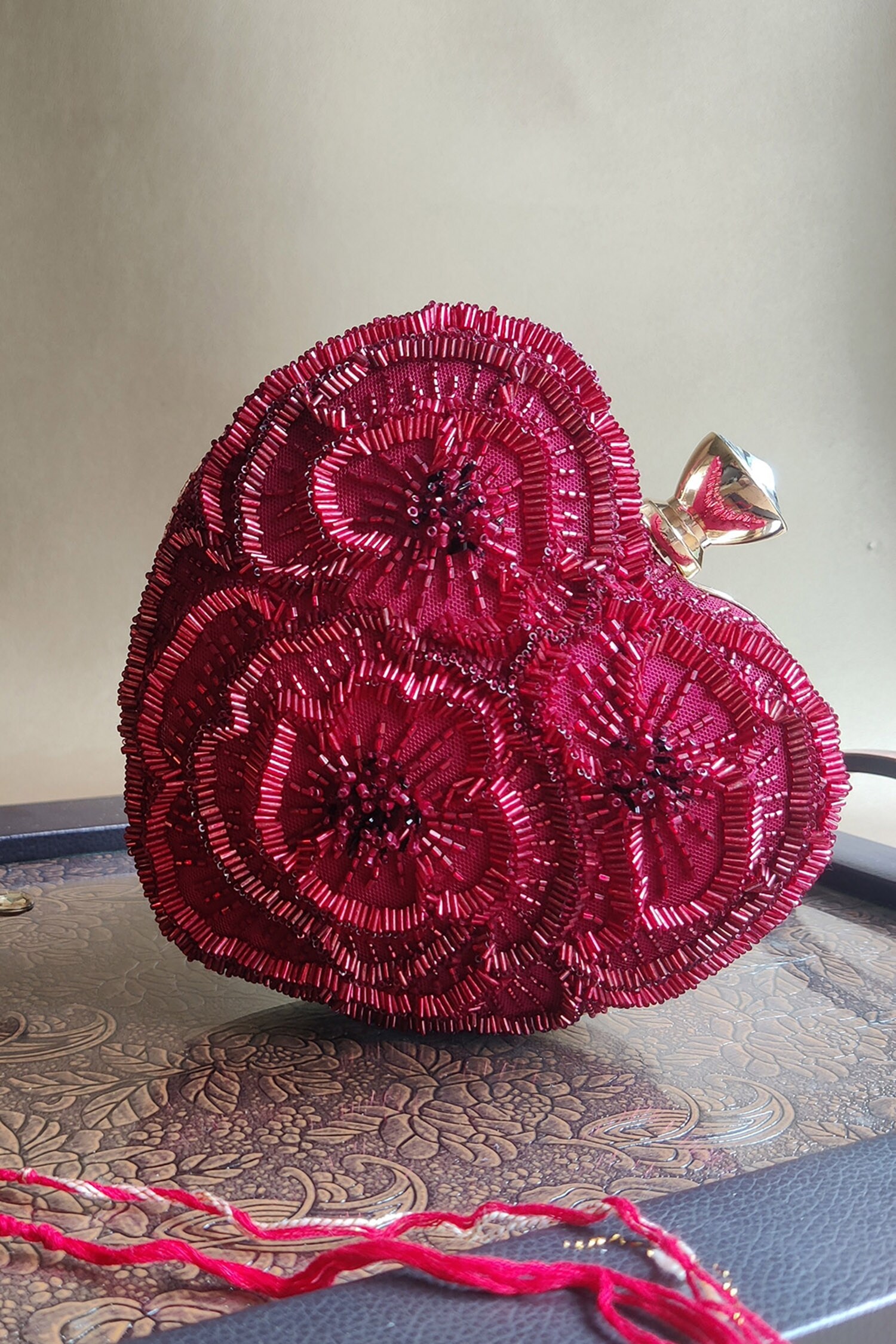 Buy Red Embellished Heart Clutch With Sling by Plode Online at Aza