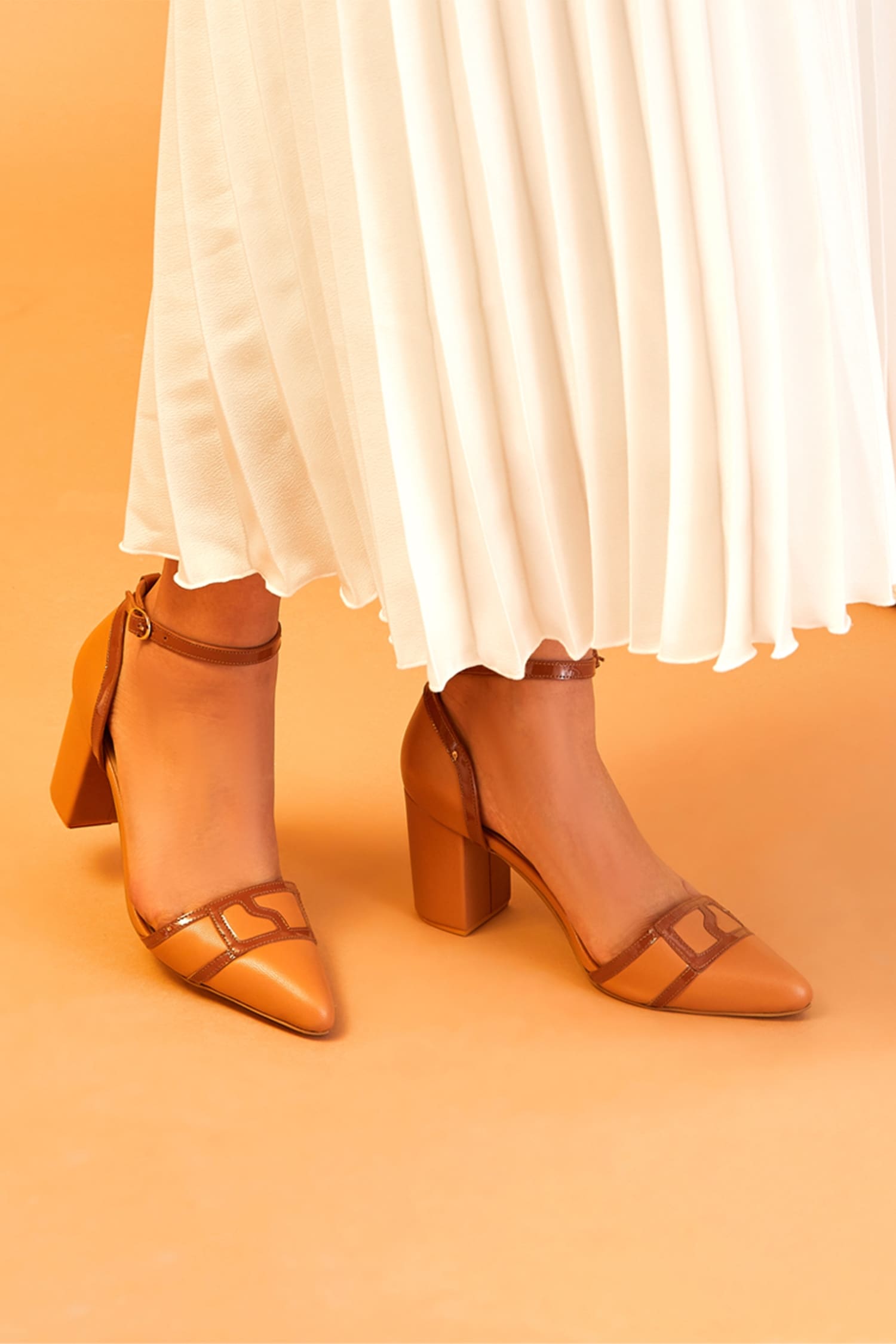 Buy Brown Oceana Pointed Toe Block Heels by OCEEDEE Online at Aza Fashions.
