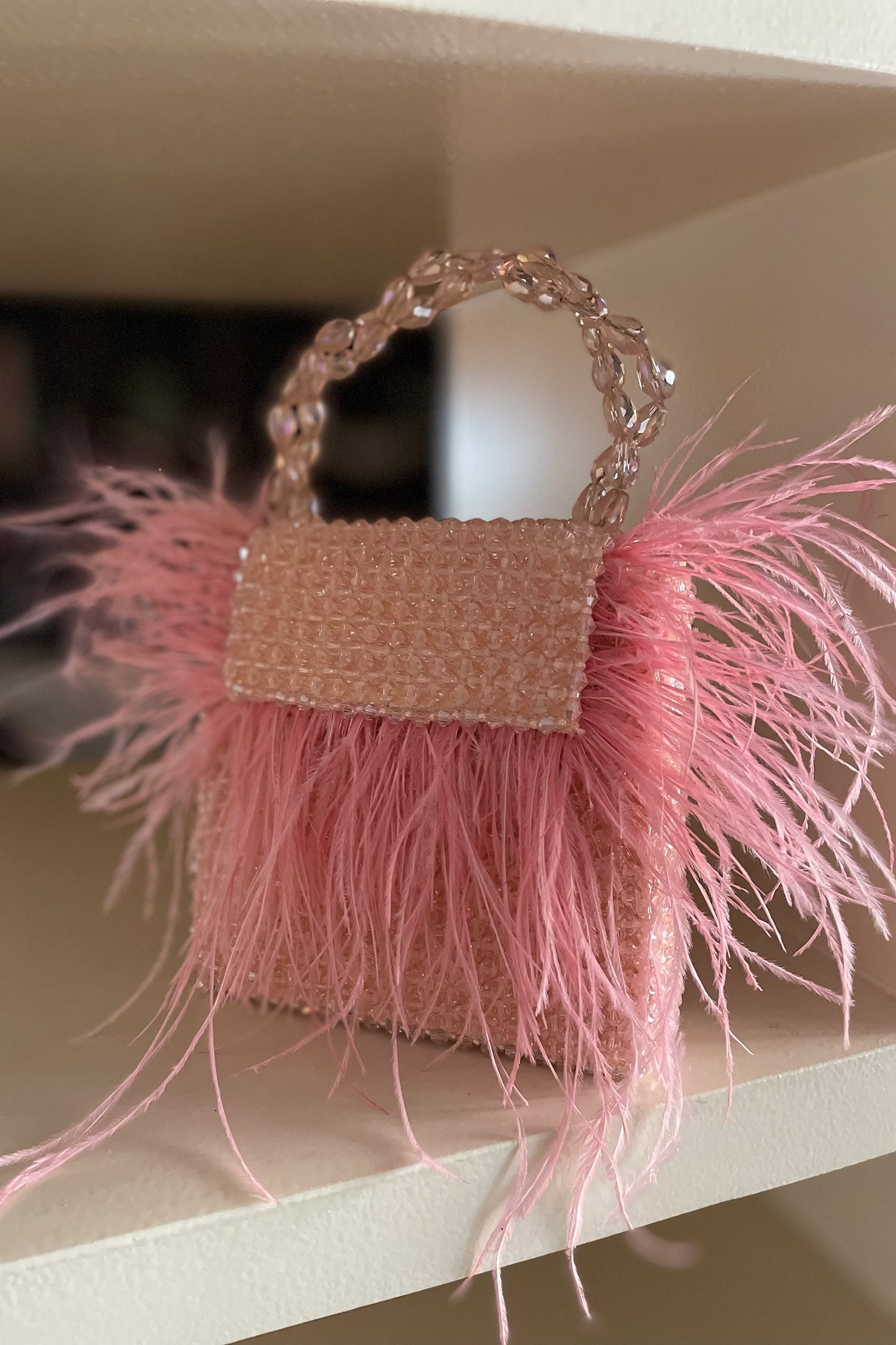 Buy Pink Embellished Mini Fur Bag by Bhavna Kumar Online at Aza Fashions.
