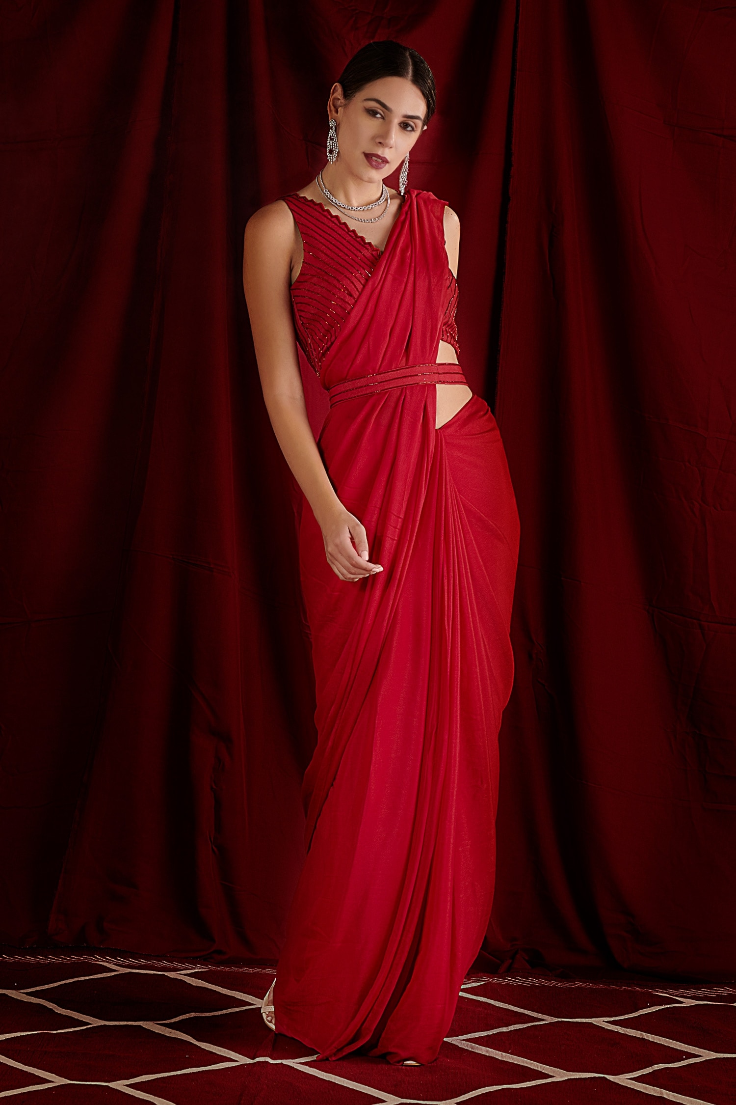 Mahavir Sarees - A red saree is a piece of adornment on a... | Facebook