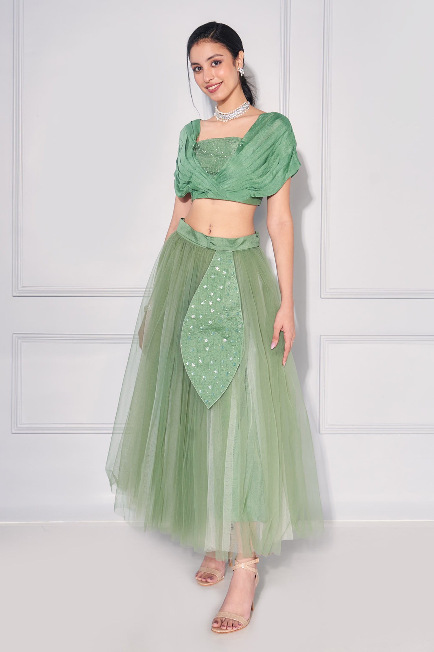 Beautiful pista green color tulli skirt and crop top with bell sleeves  Brook collection of Mrunalini