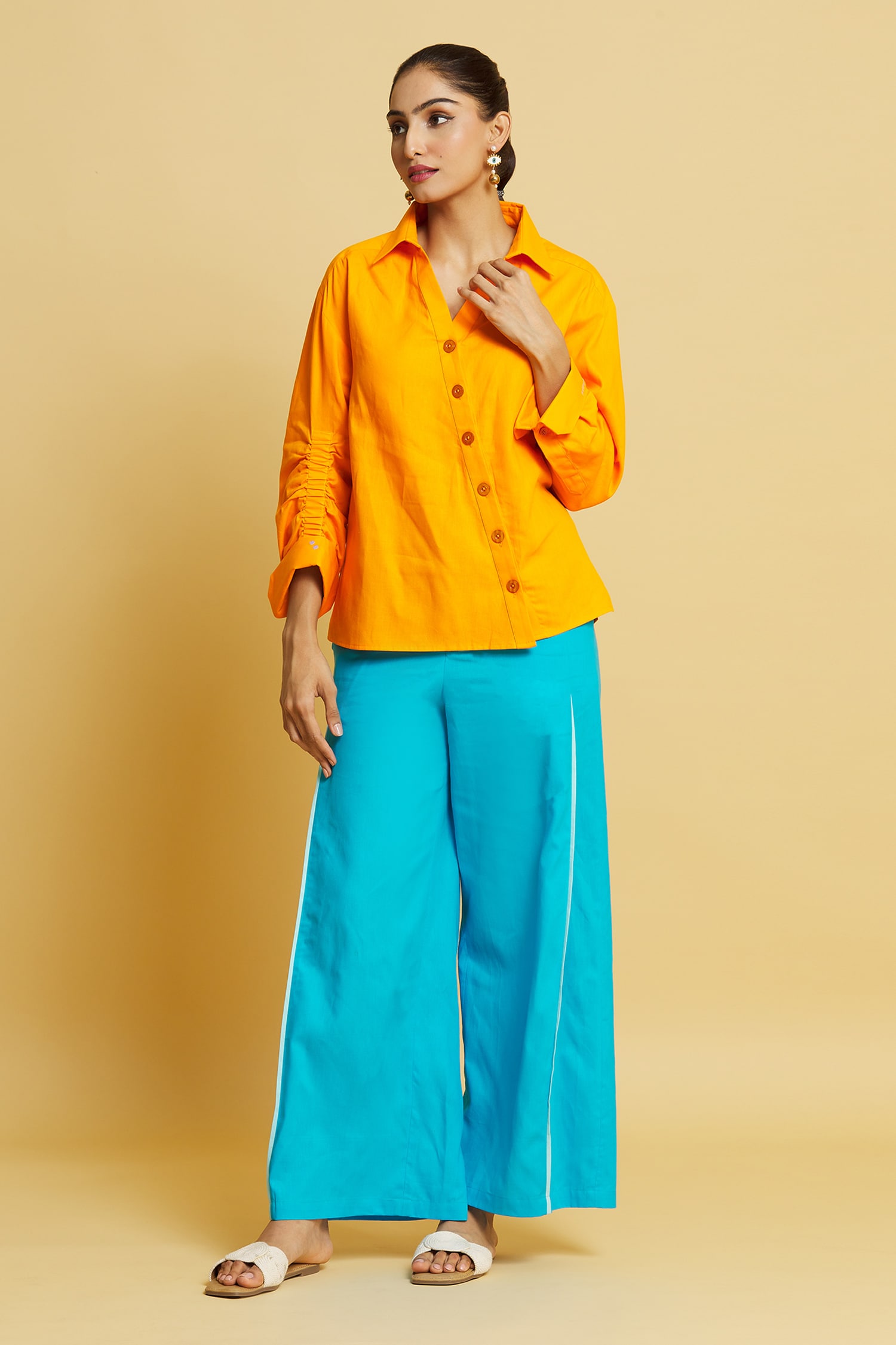 Fashionable Girl Posing in Green Summer Trousers and Yellow T-shirt on Grey  and Blue Stock Photo - Image of model, fashion: 182510170