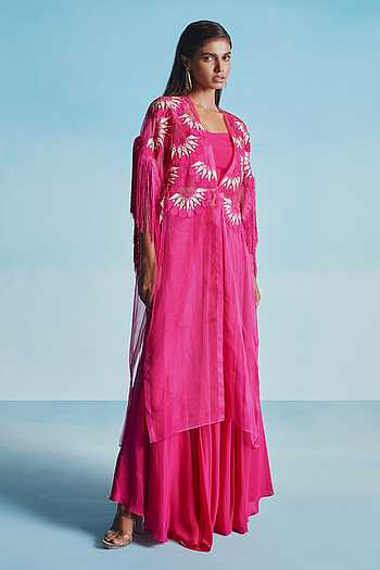 Cape shoulder top and flared pants