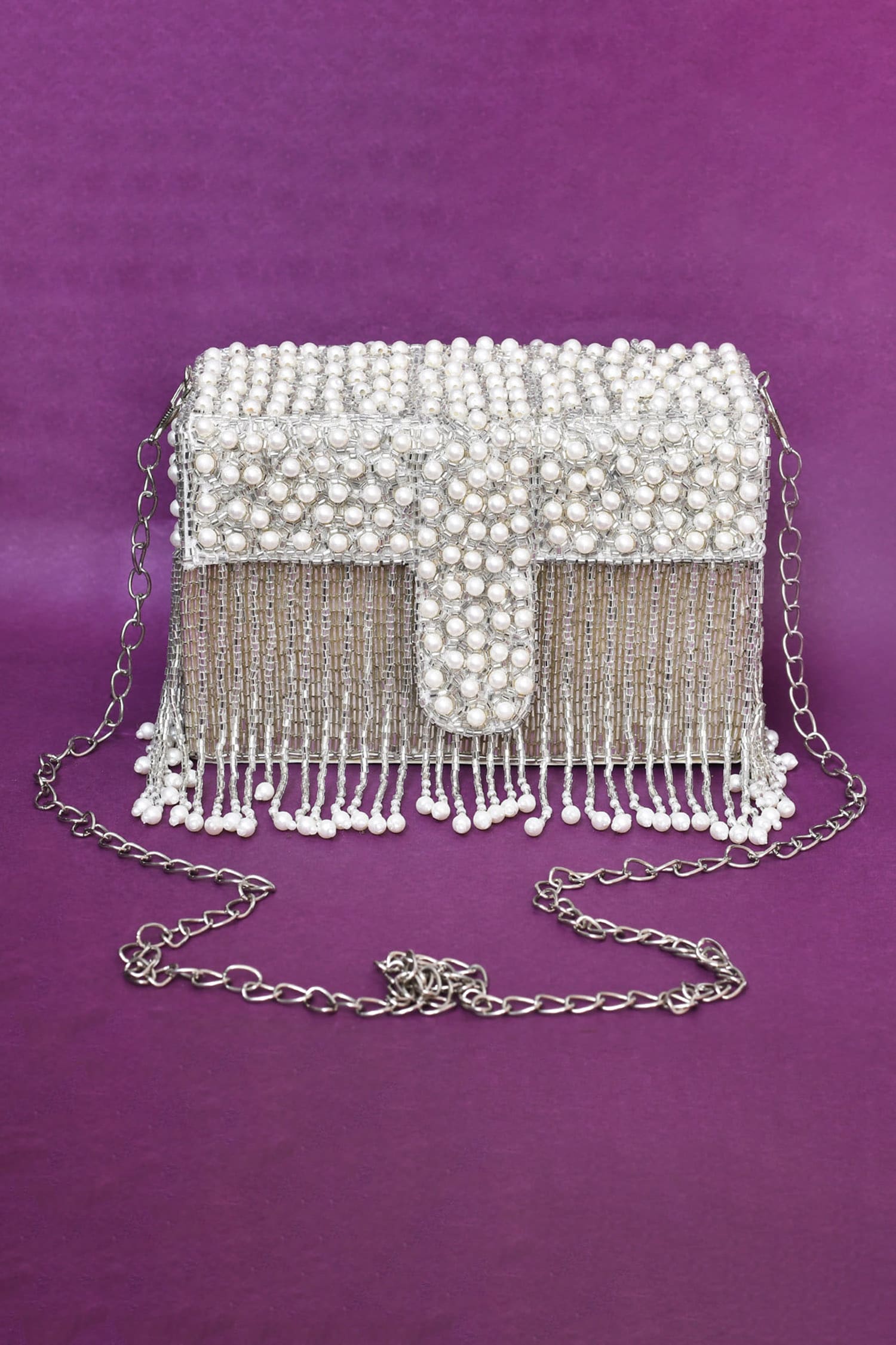 Buy Silver Embellished Tassel Detailed Sling Bag by Nayaab by