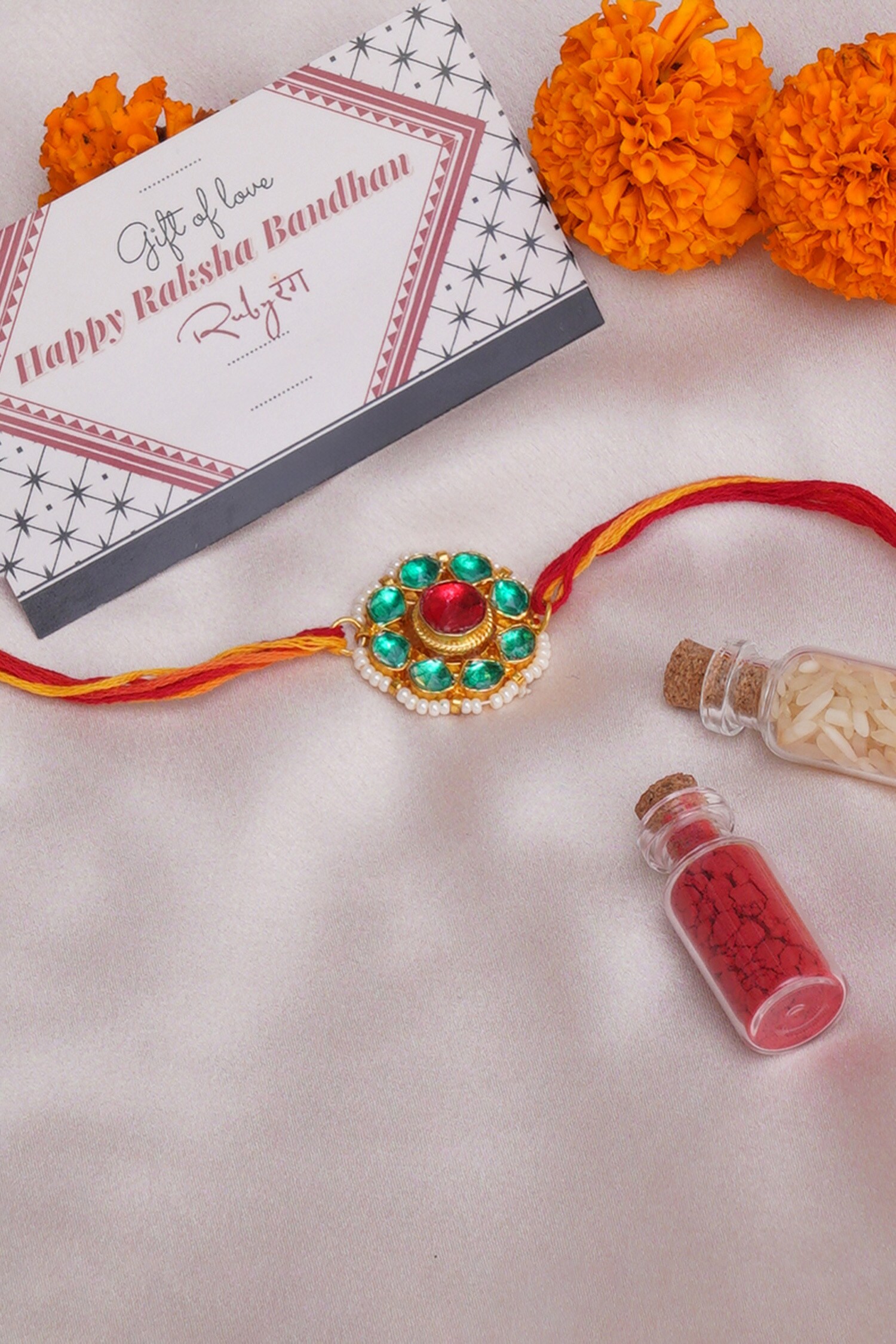 Buy Ruby Raang Kundan Stone Floral Carved Rakhi Online | Aza Fashions