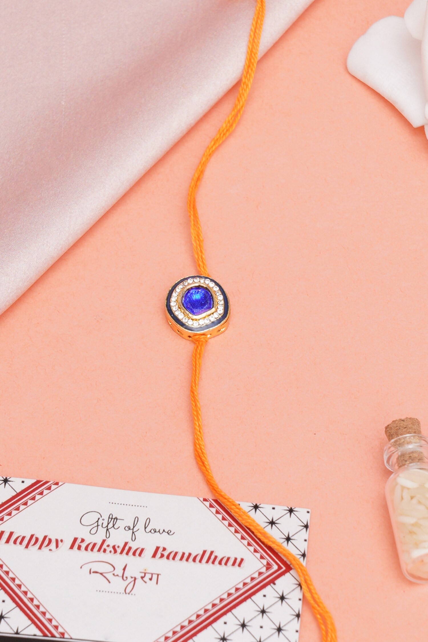 Buy Gold Kundan Stone Embellished Rakhi by Ruby Raang Online at Aza ...