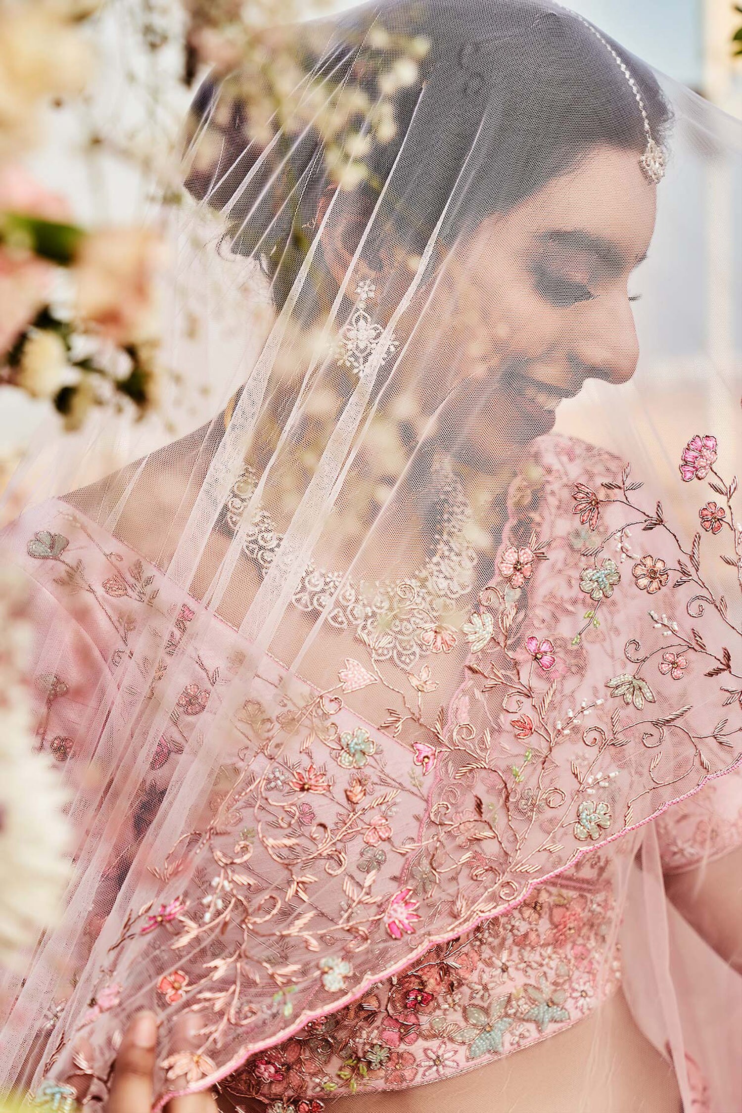 Bride Grabs Eyeballs In An Ivory-Hued Lehenga Featuring Long Veil And  Crystal Designs On Her D-Day