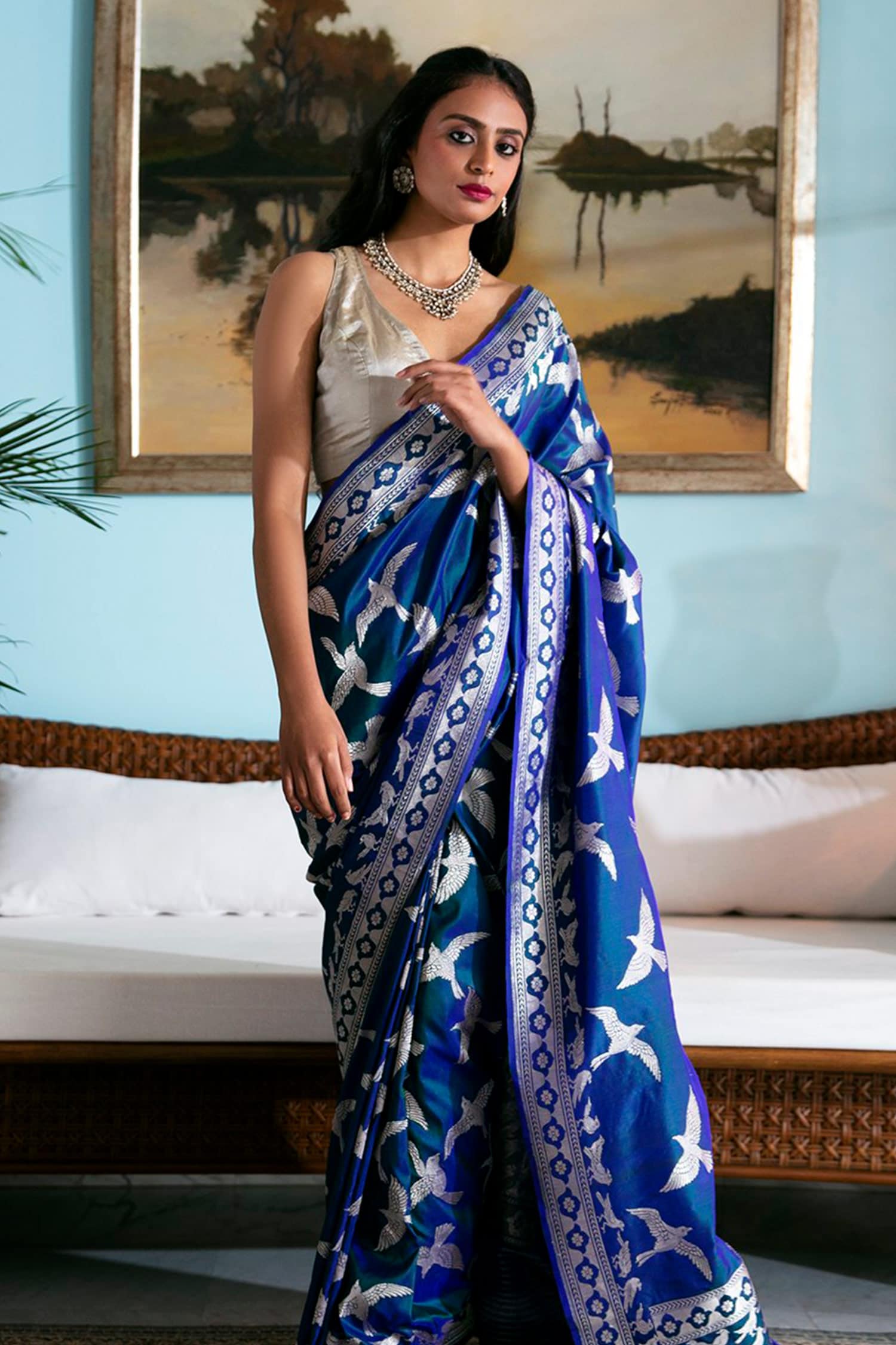 Ramya Nambessan embodies the essence of Uthhradam in a sky blue set saree!