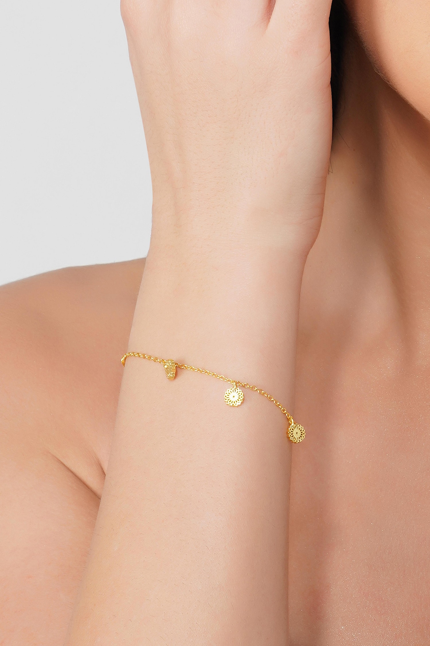 Rose gold charm bracelets with lovely trinkets 
