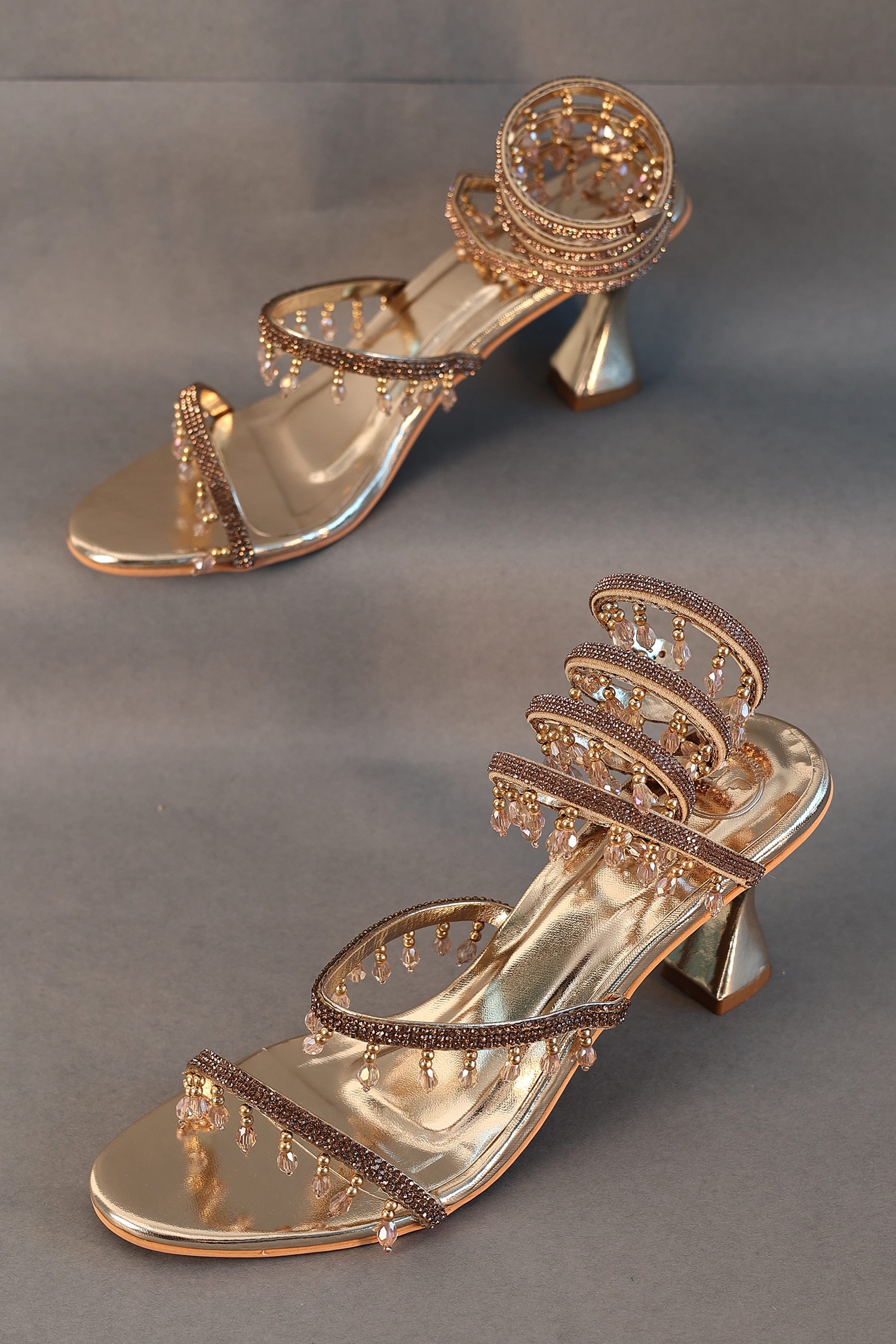 Buy Gold Embellished Stone Spring Heels by Sana K luxurious Footwear ...