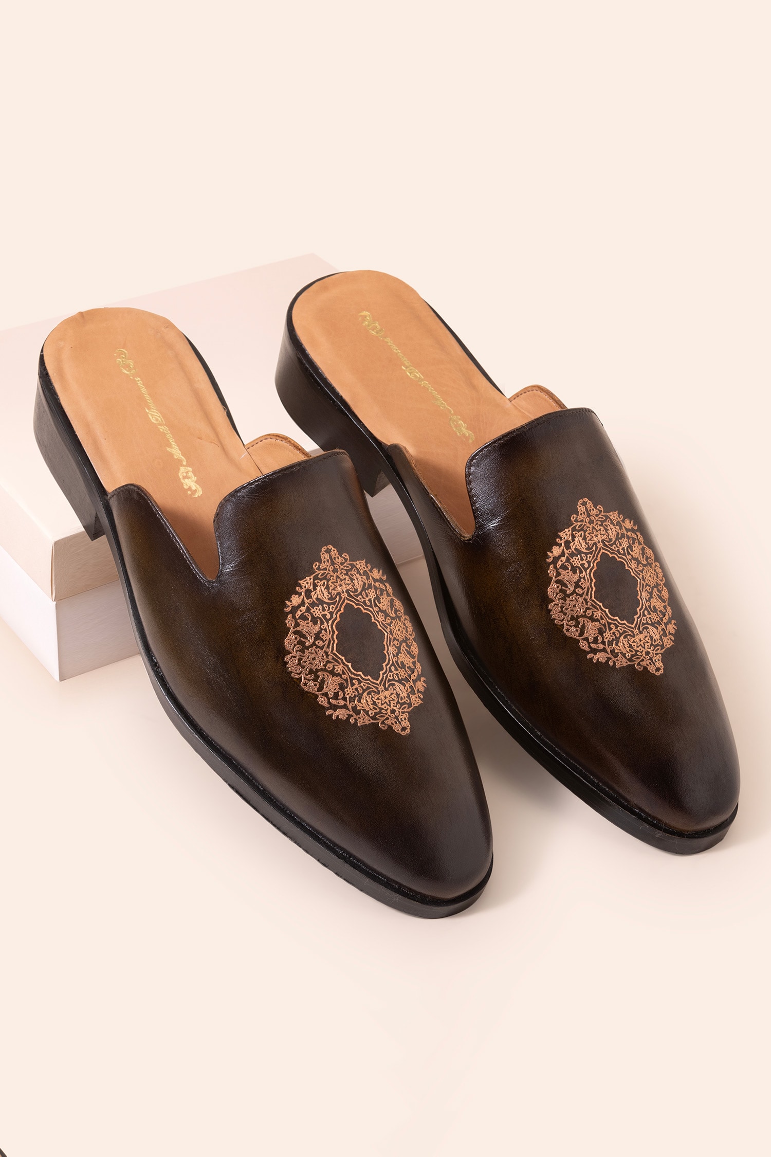Buy Brown Floral Embossed Mule Shoes For Men by Amrit Dawani Online at