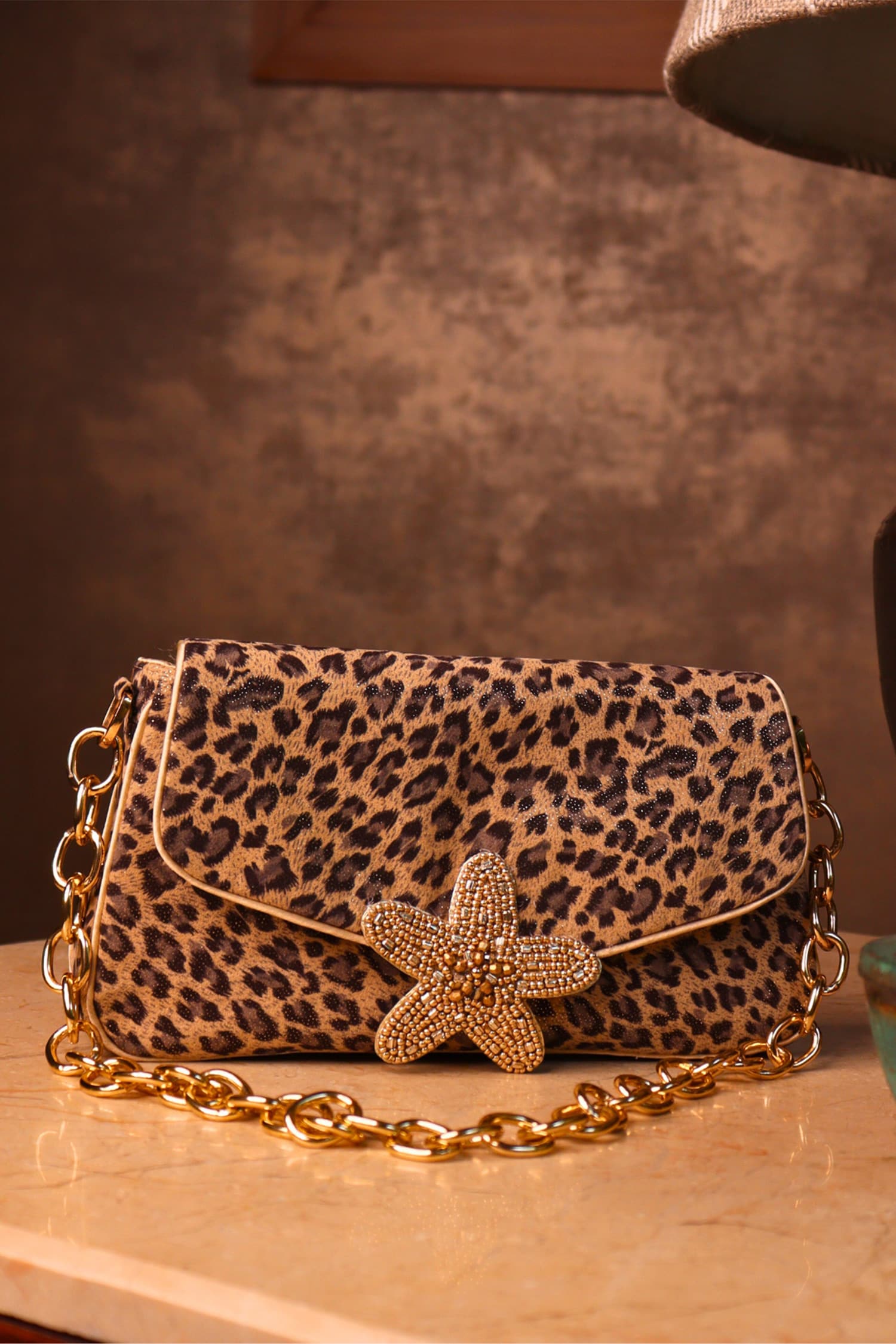 Star Bag in laminated leather with silver glitter and star in leopard-print  pony skin. | Golden Goose