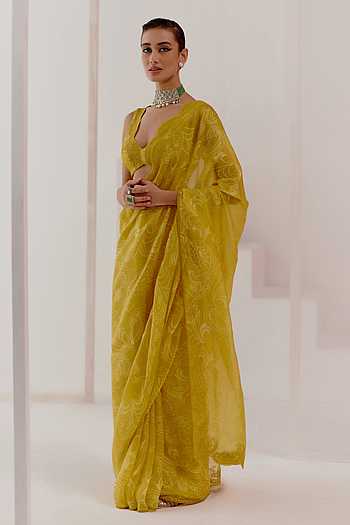 Yellow Varni Fabrics Women Floral Dolla Silk Tassels and Latkans Saree comes With Matching Blouse