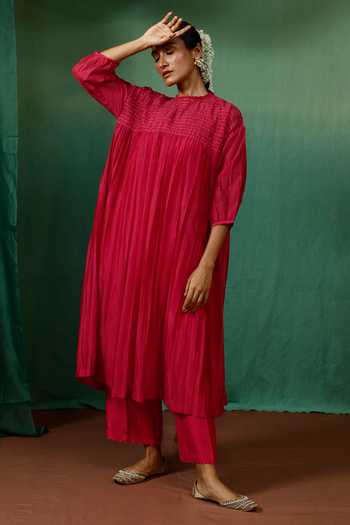 Black & Pink three-tiered kurta set with quilted yoke and all-over Pink & Green floral hand block print.