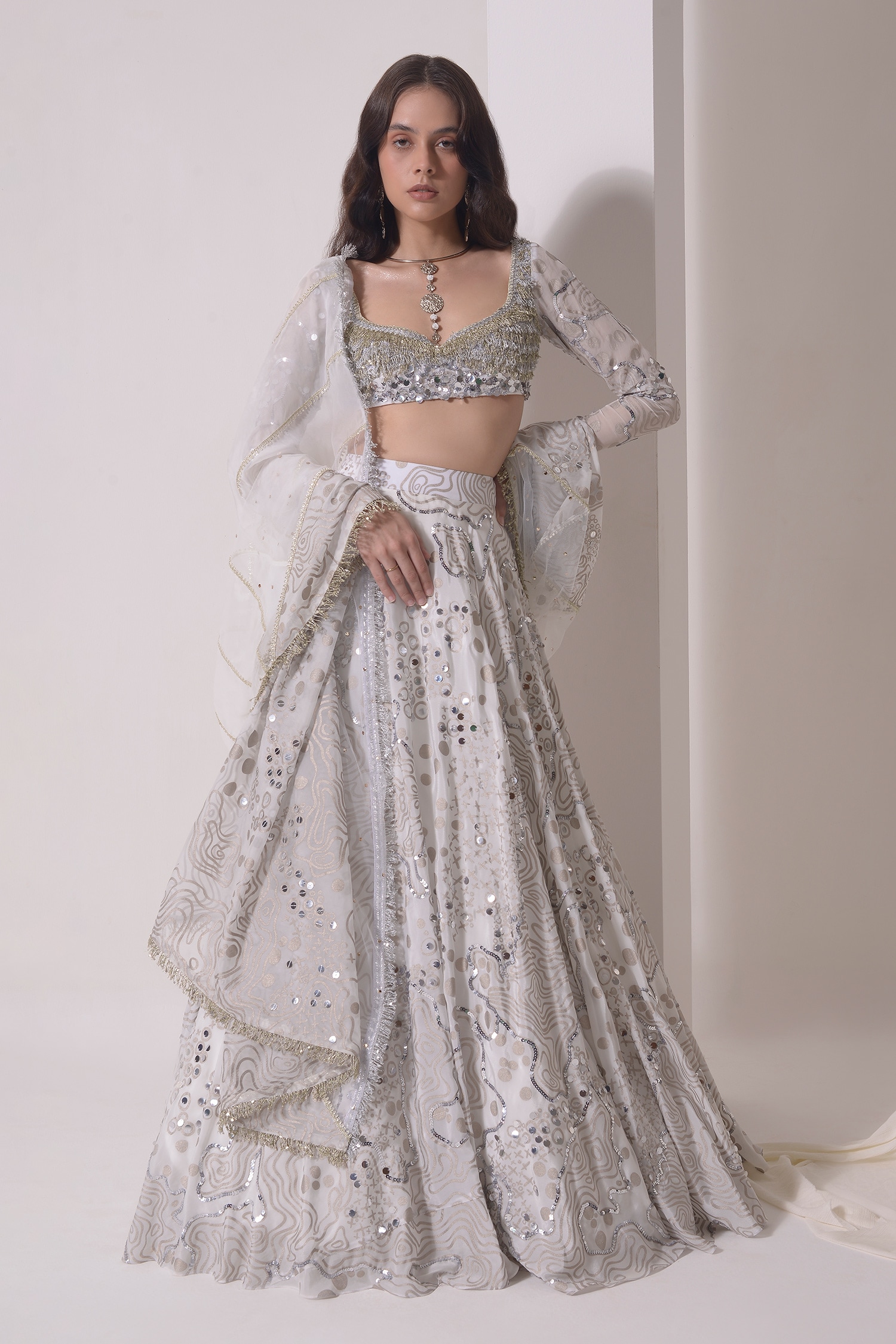 White and SilverToned Embellished Mirror Work Semi stitched Lehenga Choli -  ShopGarb - 3762875