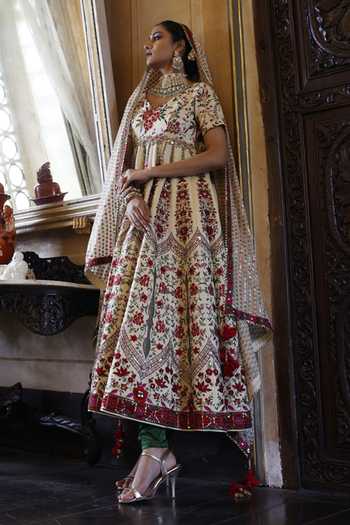 White and terracotta red material chudidar set, floral printed with button work top, printed bottom, and sequins striped dupatta main image 1