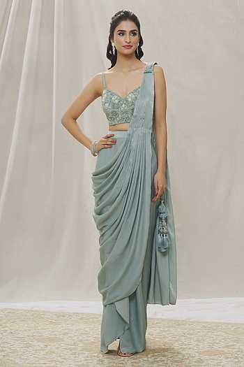AM309 - imported digital print sequin saree in Teal color.Comes with stitched blouse size 38, can be altered to size 42 main image 1