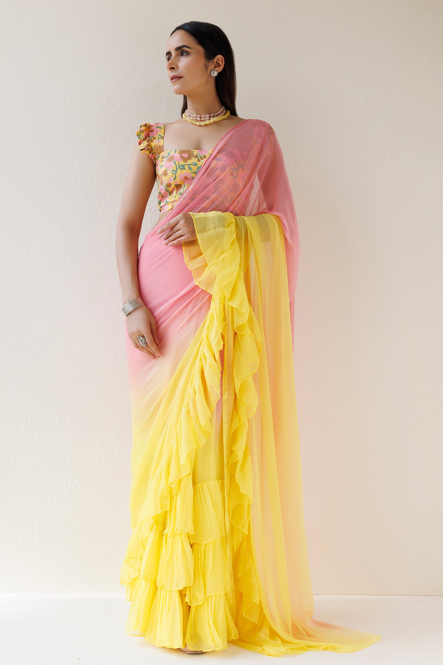 Spicy mustard tribal vase and kalash saree with knockout pink blouse piece  available only at IBFW