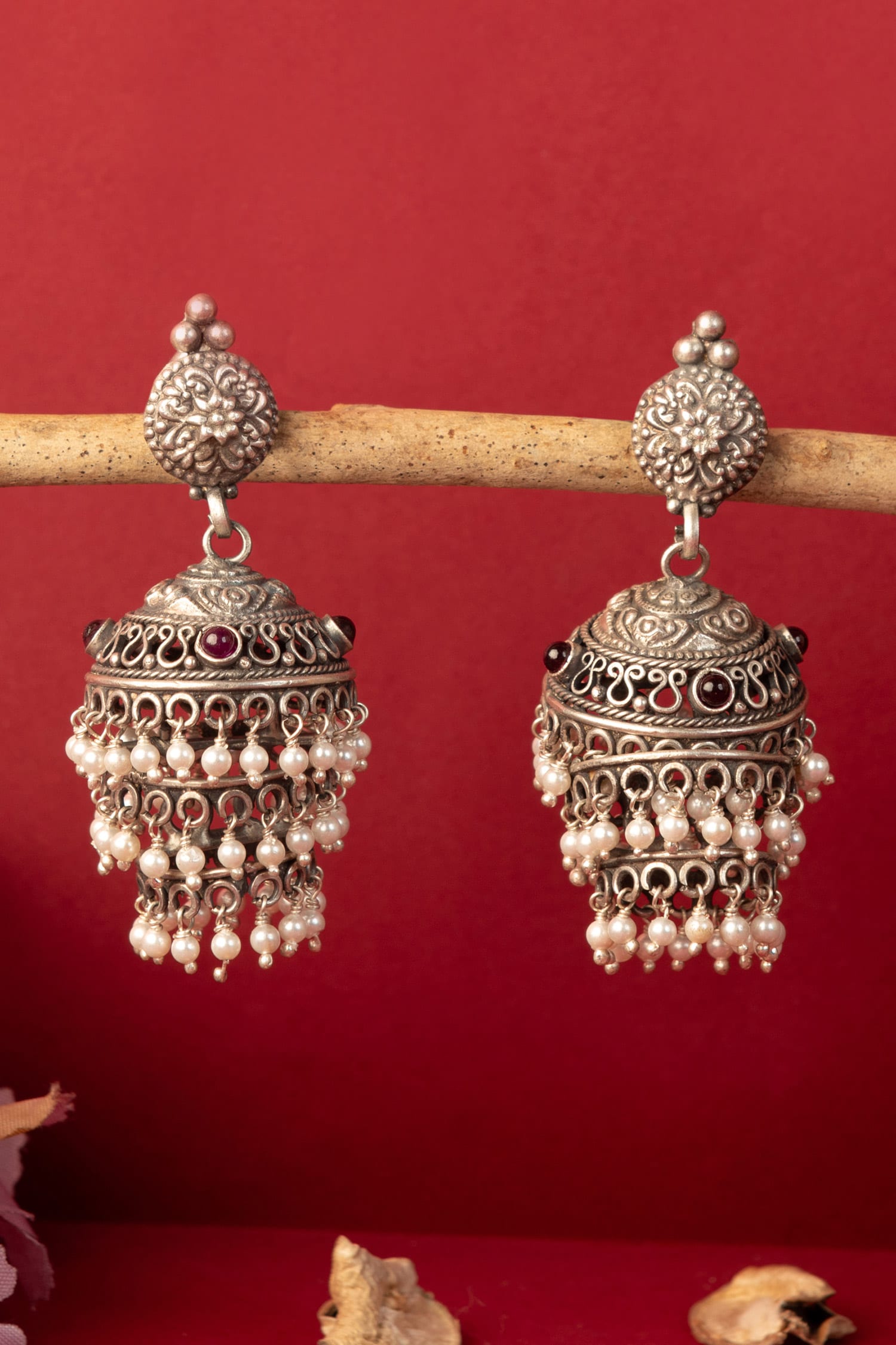 Buy Silver Plated Kemp Stones Pearl Drop Carved Jhumkas by Mero ...