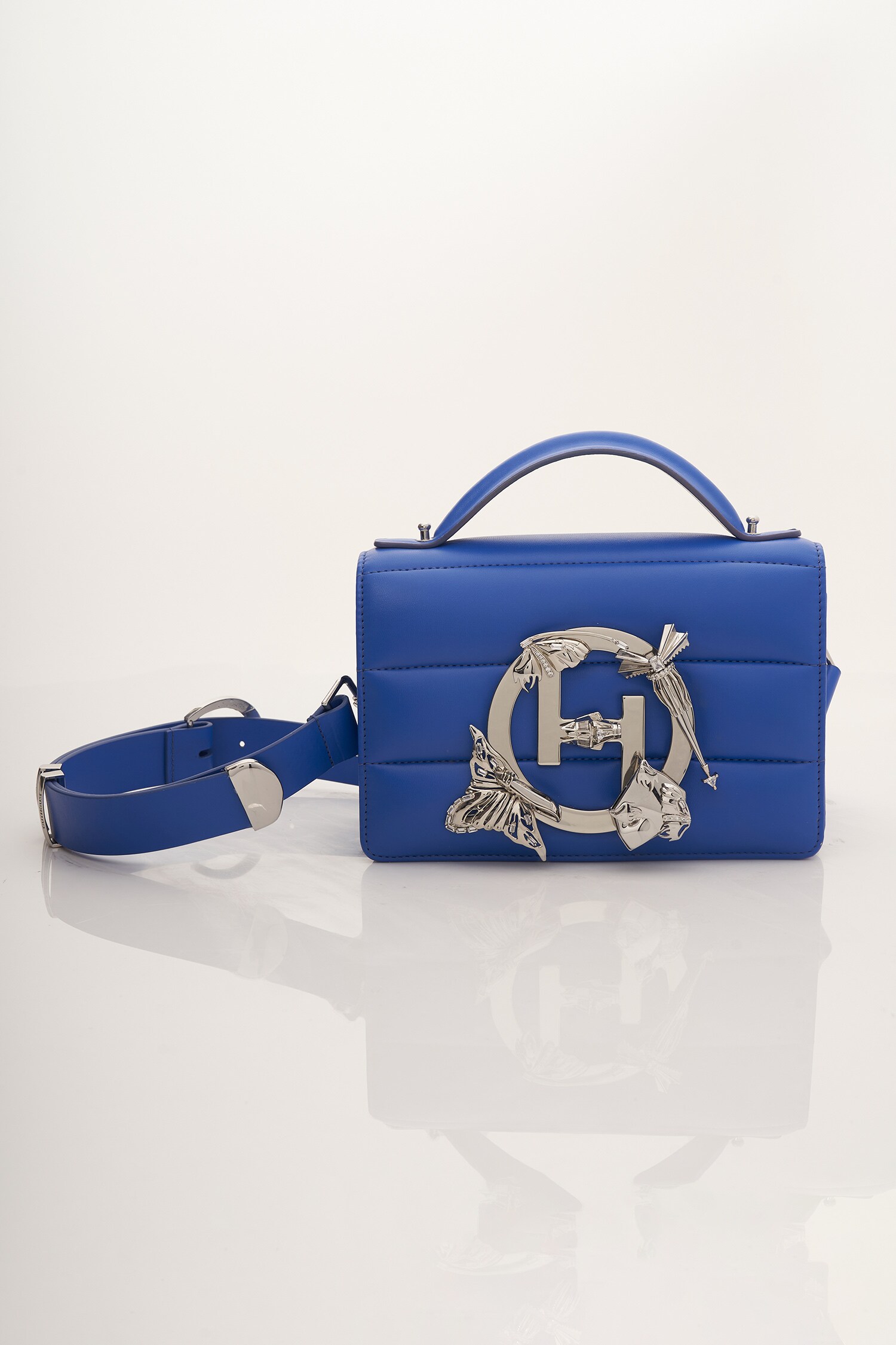 Buy Blue Midi Disco Vegan Leather Bag by Outhouse Online at Aza Fashions.