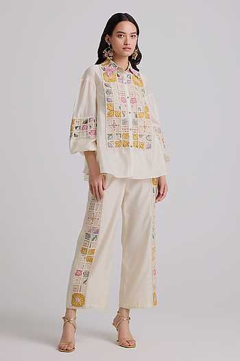 Off white cotton chanderi shirt with all-over blue floral hand block print and full sleeves.