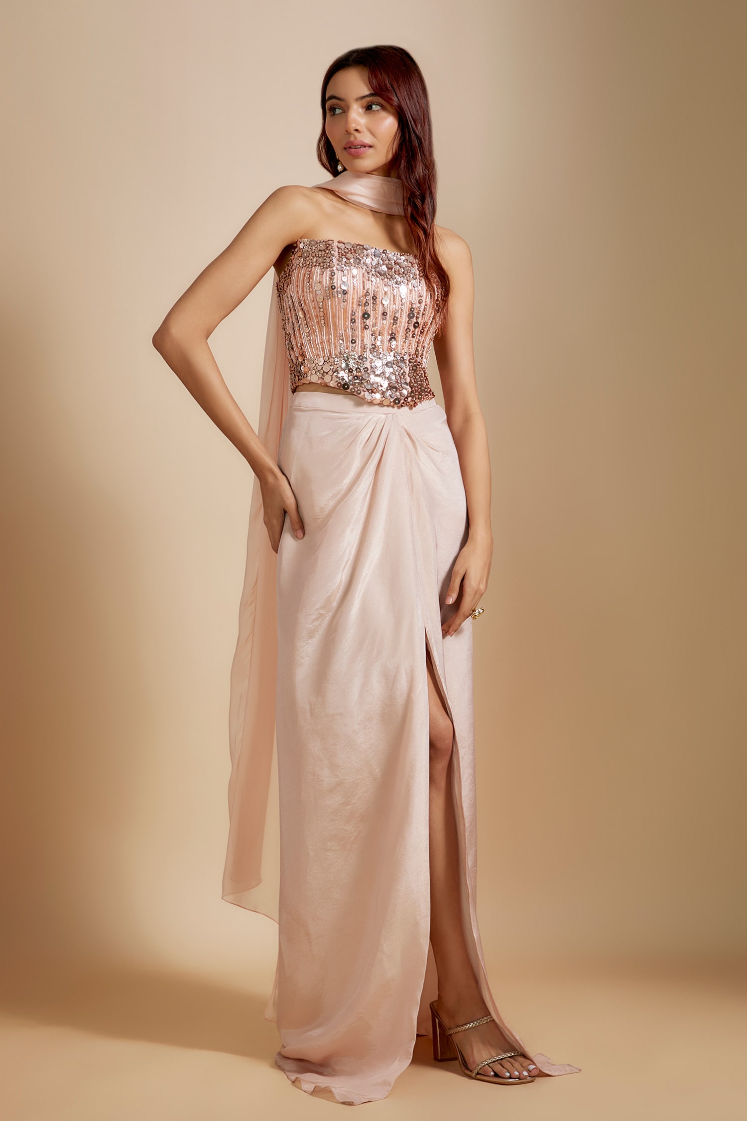 Buy Peach Net Hand Embroidered Sequins Straight Corset And Draped Skirt Set For Women by Masumi ...