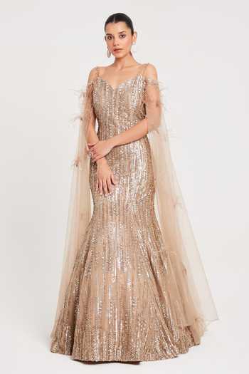Buy Gold Net, Tissue Sequins, Beads, Cut Work Cutdana Embroidered Fish Gown For Women by Chaashni By Maansi And Ketan Online at Aza Fashions. Buy Gold Net, Tissue Sequins, Beads, Cut Work Cutdana Embroidered Fish Gown For Women by Chaashni By Maansi And Ketan Online at Aza Fashions.