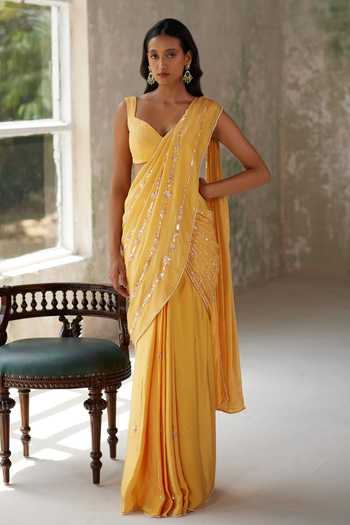 Yellow/white chiffon saree with border mirror work- stitched sleeveless blouse main image 1