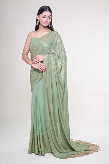 Sea Green Woven Design Silk Blend Saree With Unstitched Blouse Piece