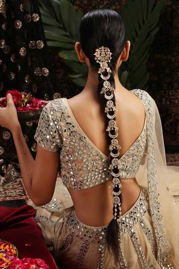 sachin and babi light blue dress Ananya Panday turns heads in a gold halter-neck gown, detailed with  intricate sequins and a sculpted silhouette ✨ The backless cut with a  subtle slit adds refined evening drama, while a sleek main image 1