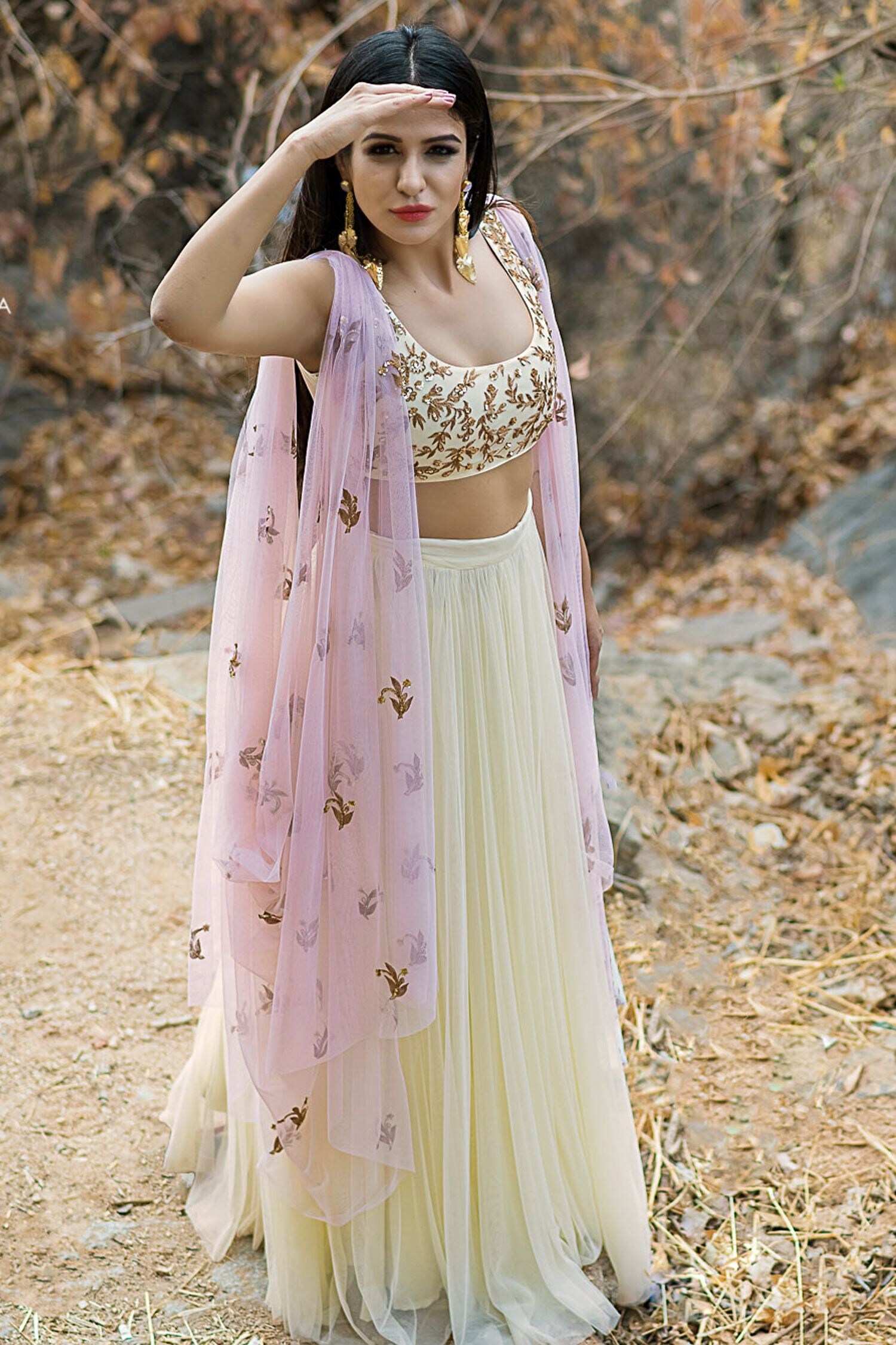 Buy Pastel yellow lehenga set with cowl drape by Prathyusha Garimella