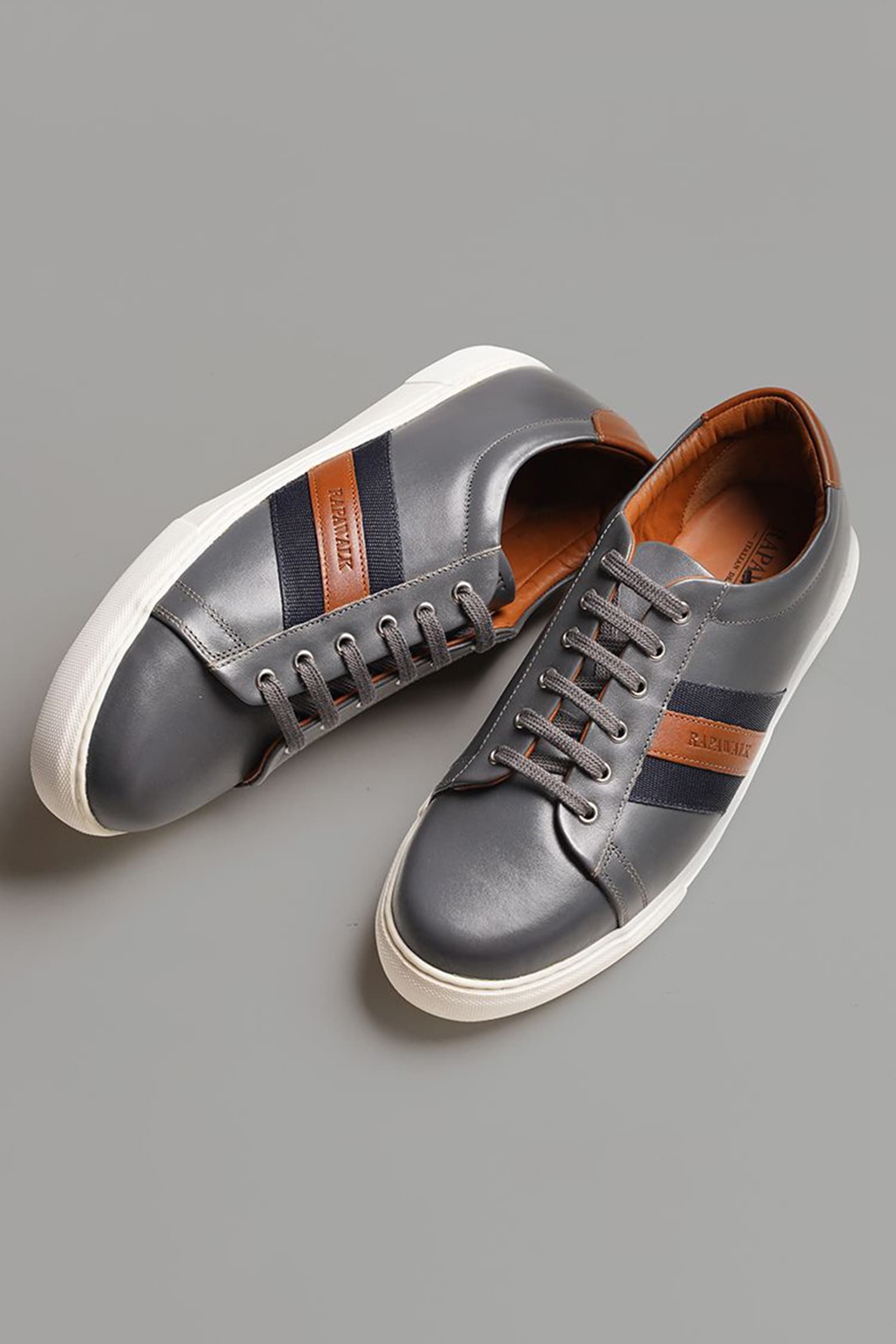 Buy Brown Striped Lace Up Leather Sneakers For Men by Rapawalk