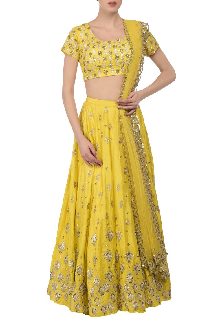 Buy Lemon yellow & silver embroidered lehenga set by Astha Narang at ...