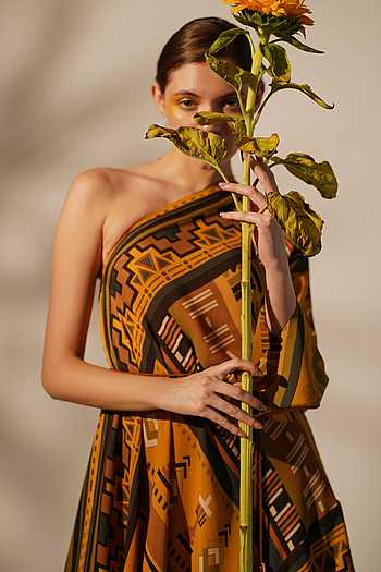 gold aztec dress G O L D , Aztec culture revered gold as sacred and powerful. This stunning  dress pays homage to gold, featuring a macrame armor adorned with gold for  the goddess warrior. The silk chiffon skirt adds