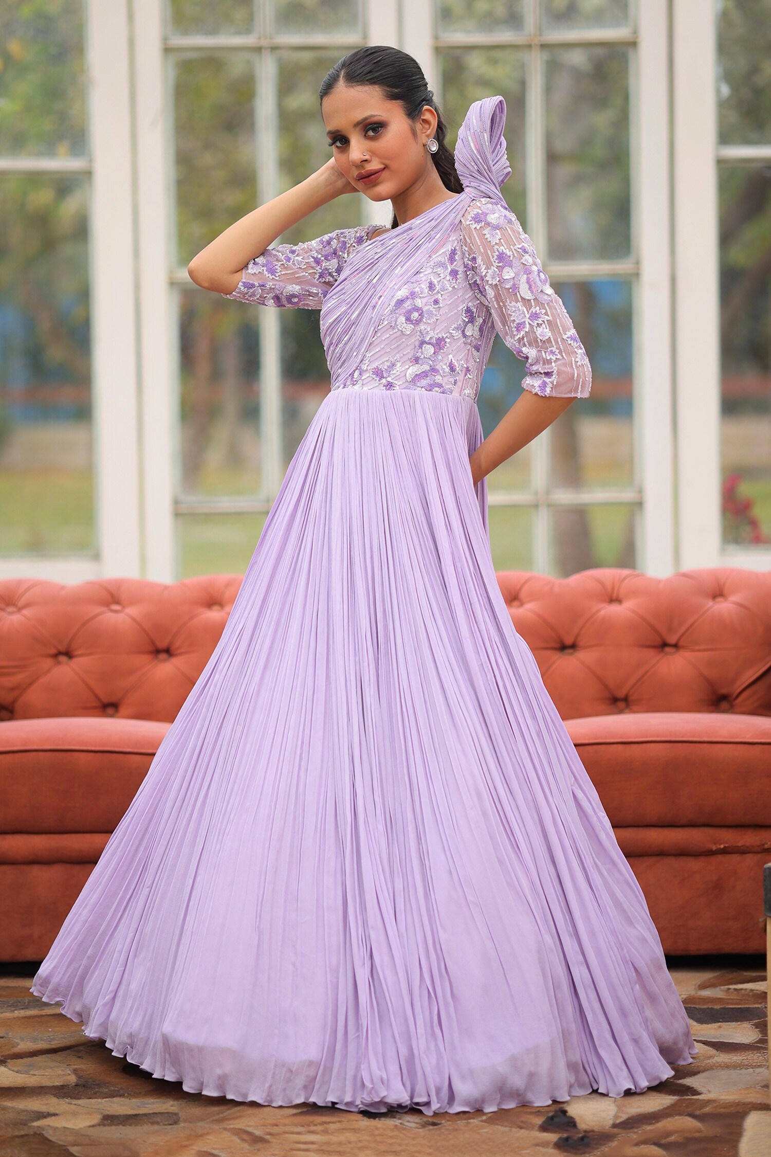 Plum gown with outlet sleeves