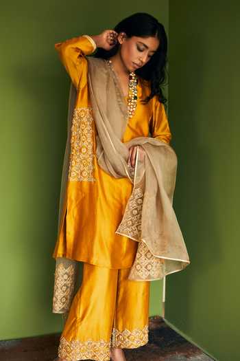 Olive Yellow Silk Chanderi paneled kurta set with all-over small Pink & Yellow flower hand block print. main image 1