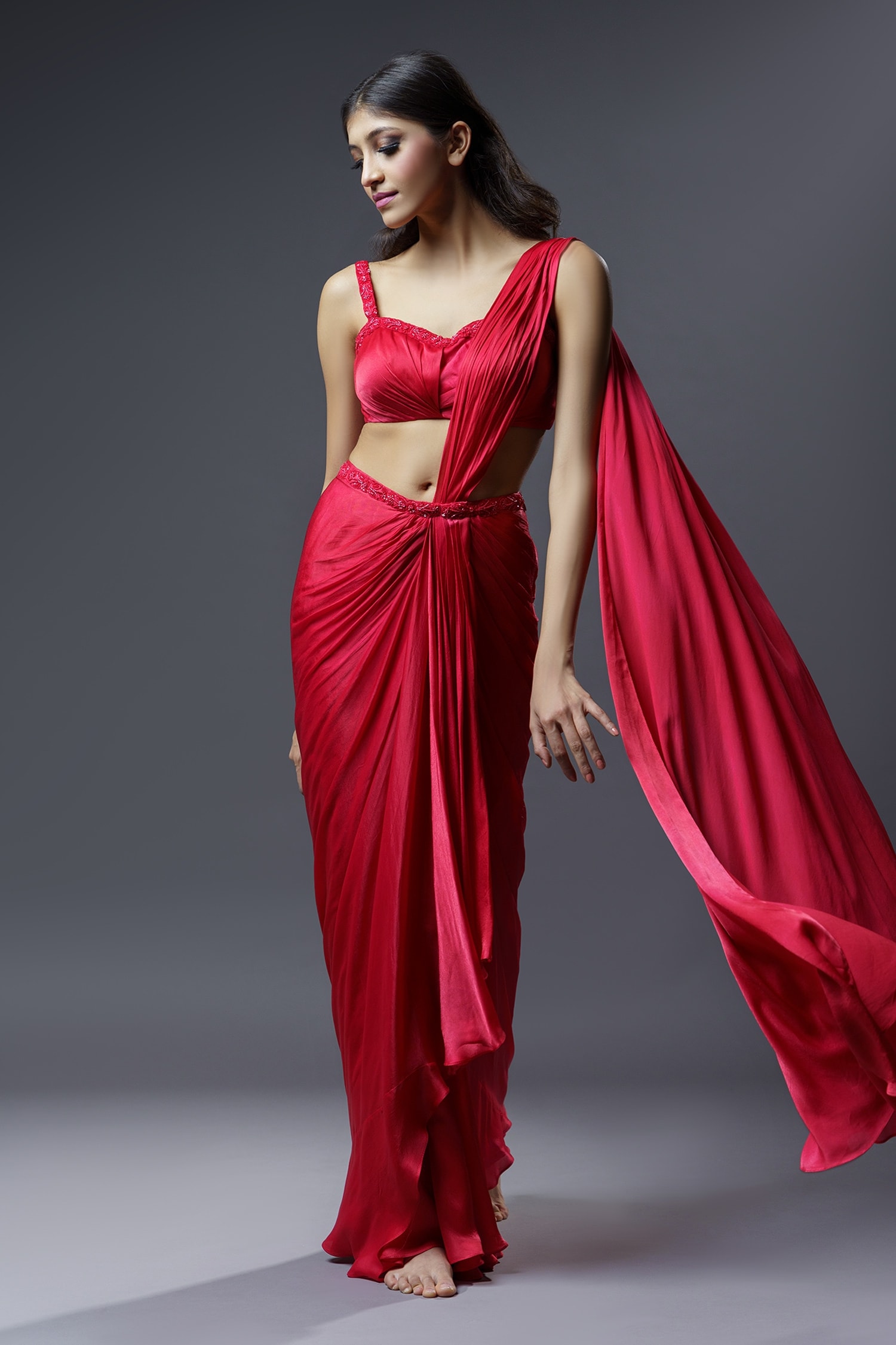 Beautiful Satin Draped Dresses in Saree style | Gown dress design, Wedding  blouse designs, Indian fashion dresses