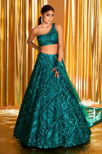 Navy Blue Kaya Printed Designer Lehenga with one shoulder Blouse + Empowering Soft Hand-embroidered Clutch Pouch + Uncut Kundan Set- Rent main image 0