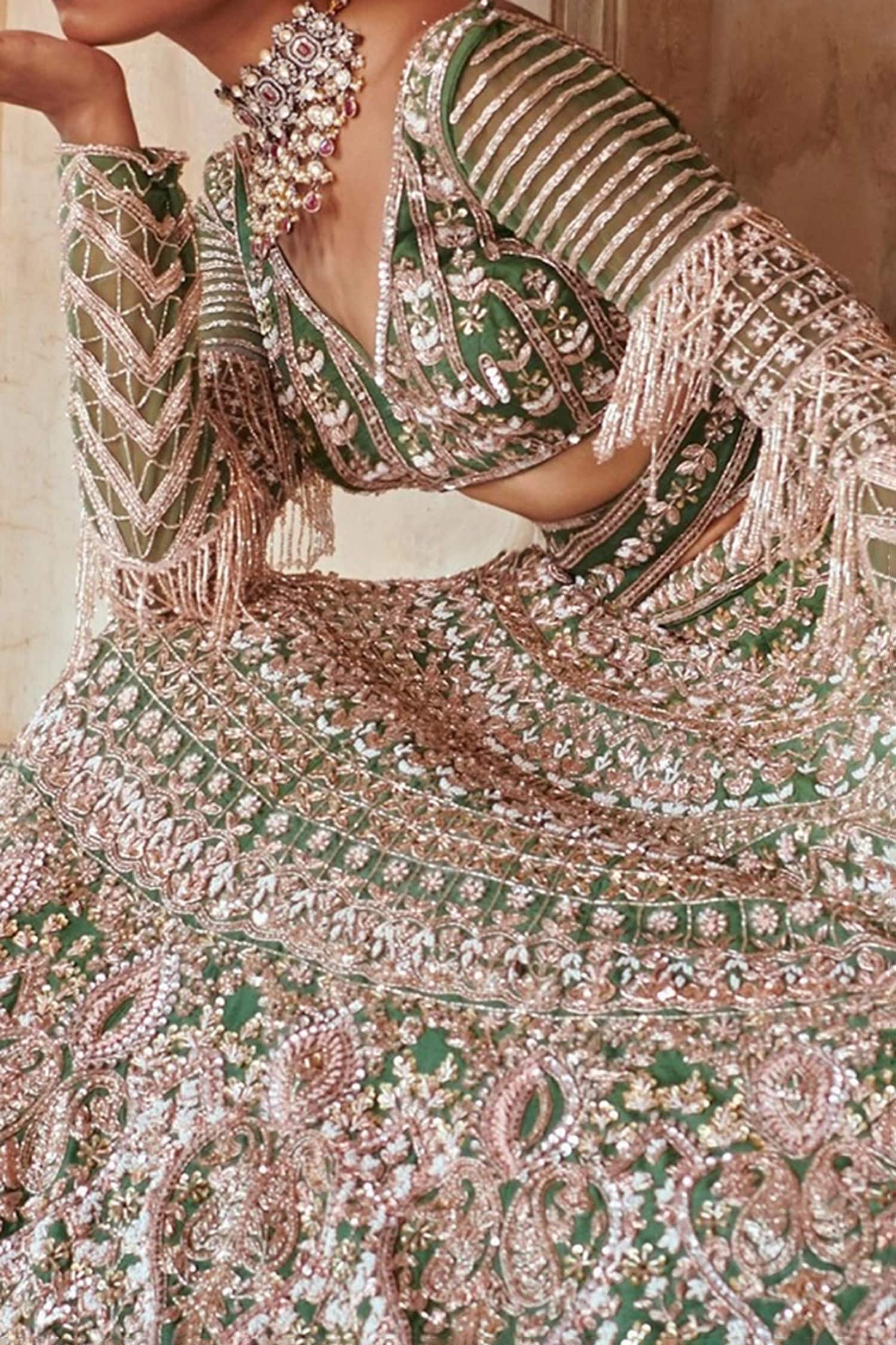 Shop_Bindani by Jigar & Nikita_Emerald Green Pure Raw Silk Paisley Embroidered Lehenga Set_at_Aza_Fashions